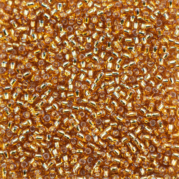 11/0 TOHO Seed Bead - Silver-Lined Topaz