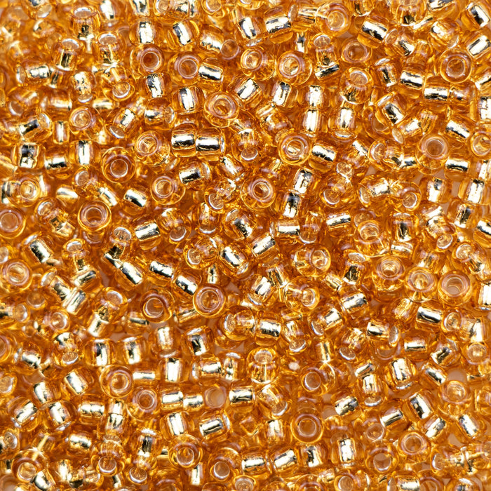 8/0 TOHO Seed Bead - Silver-Lined Medium Topaz