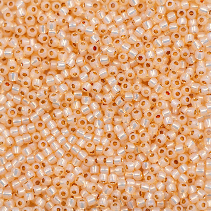 11/0 TOHO Seed Bead - PermaFinish - Silver-Lined Milky Light Topaz